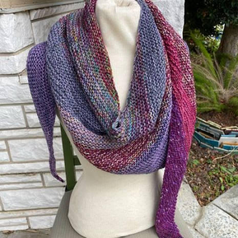 Boomerang shawl hand knit in mixed fibers, in blues, purples and magentas